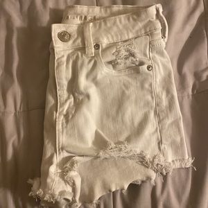 All white American Eagle jean shorts